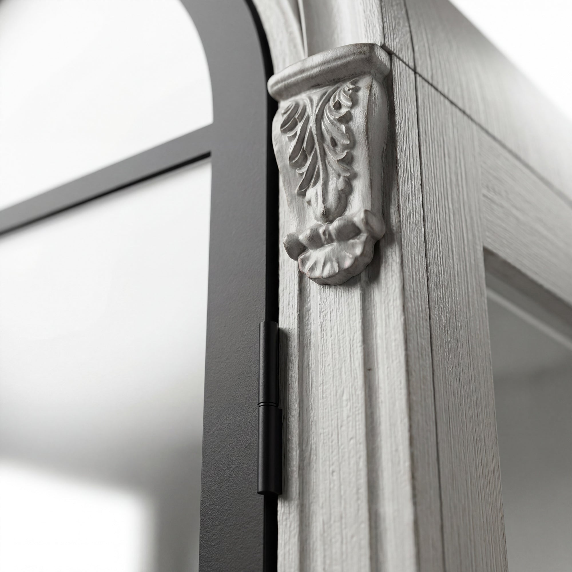 Arched display cabinet with glass doors and drawers