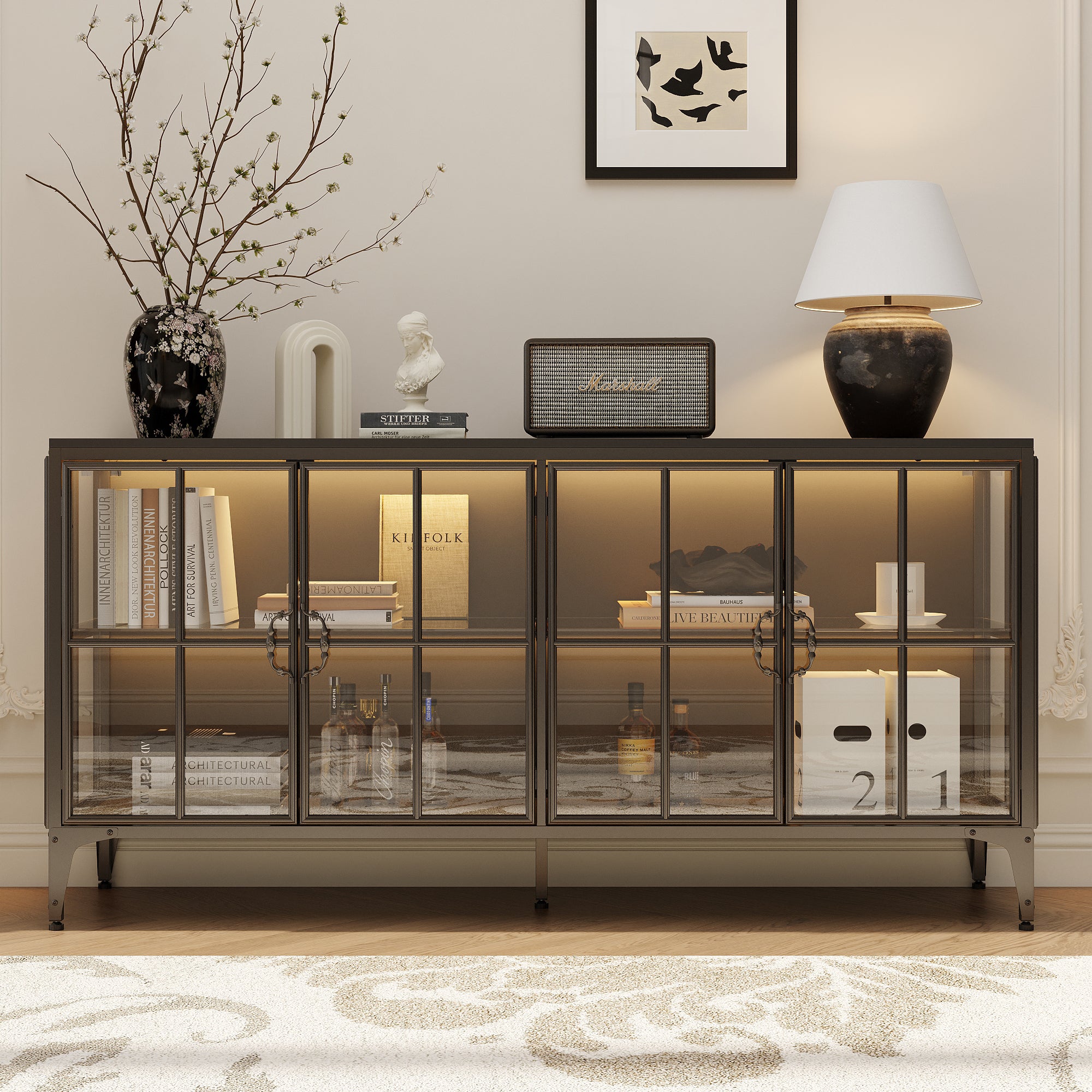 Modern glass cabinet with decorative items in a stylish room setting.