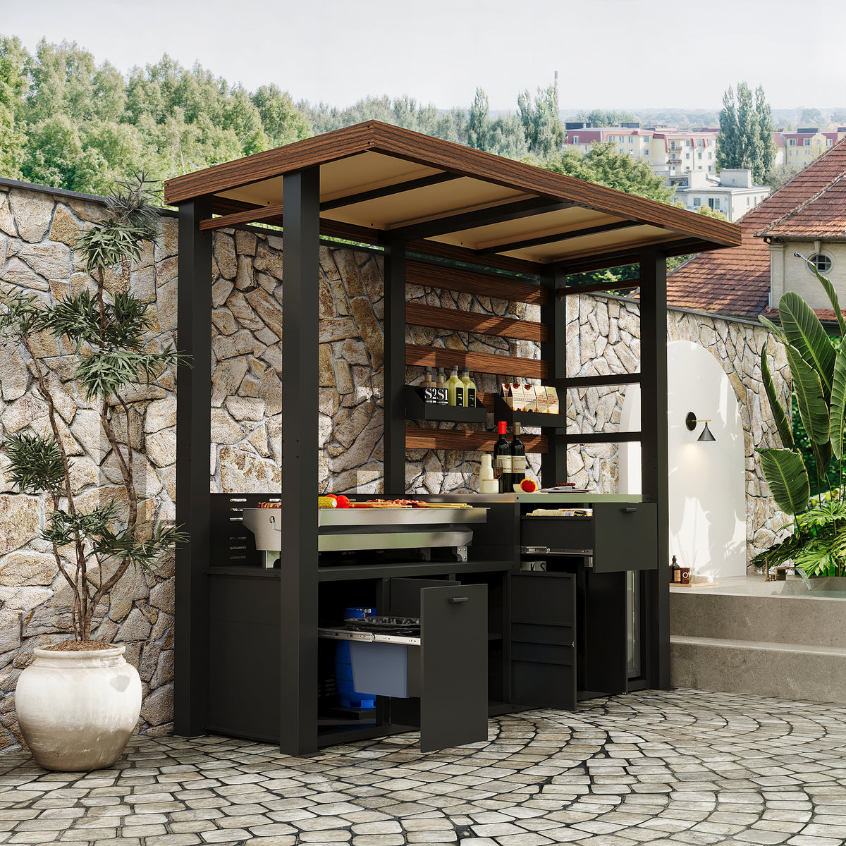 Outdoor kitchen with canopy and stone wall in a garden setting