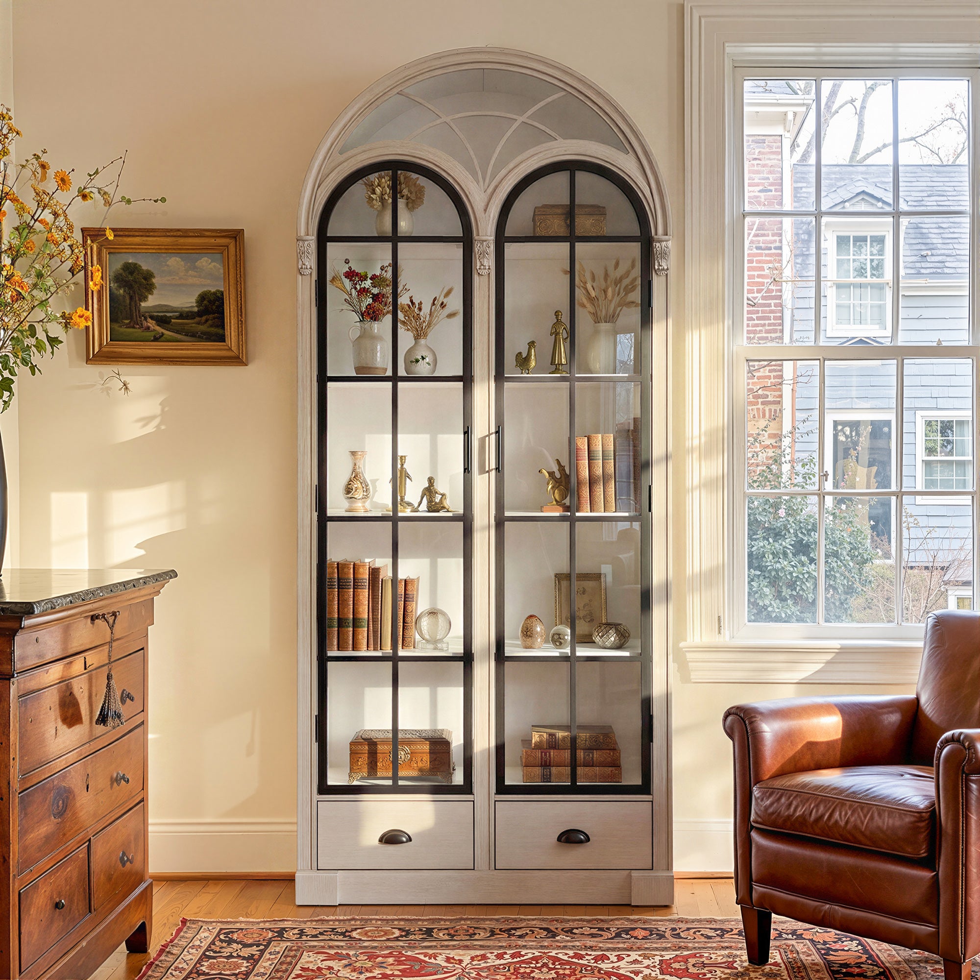 Arched display cabinet with glass doors and drawers