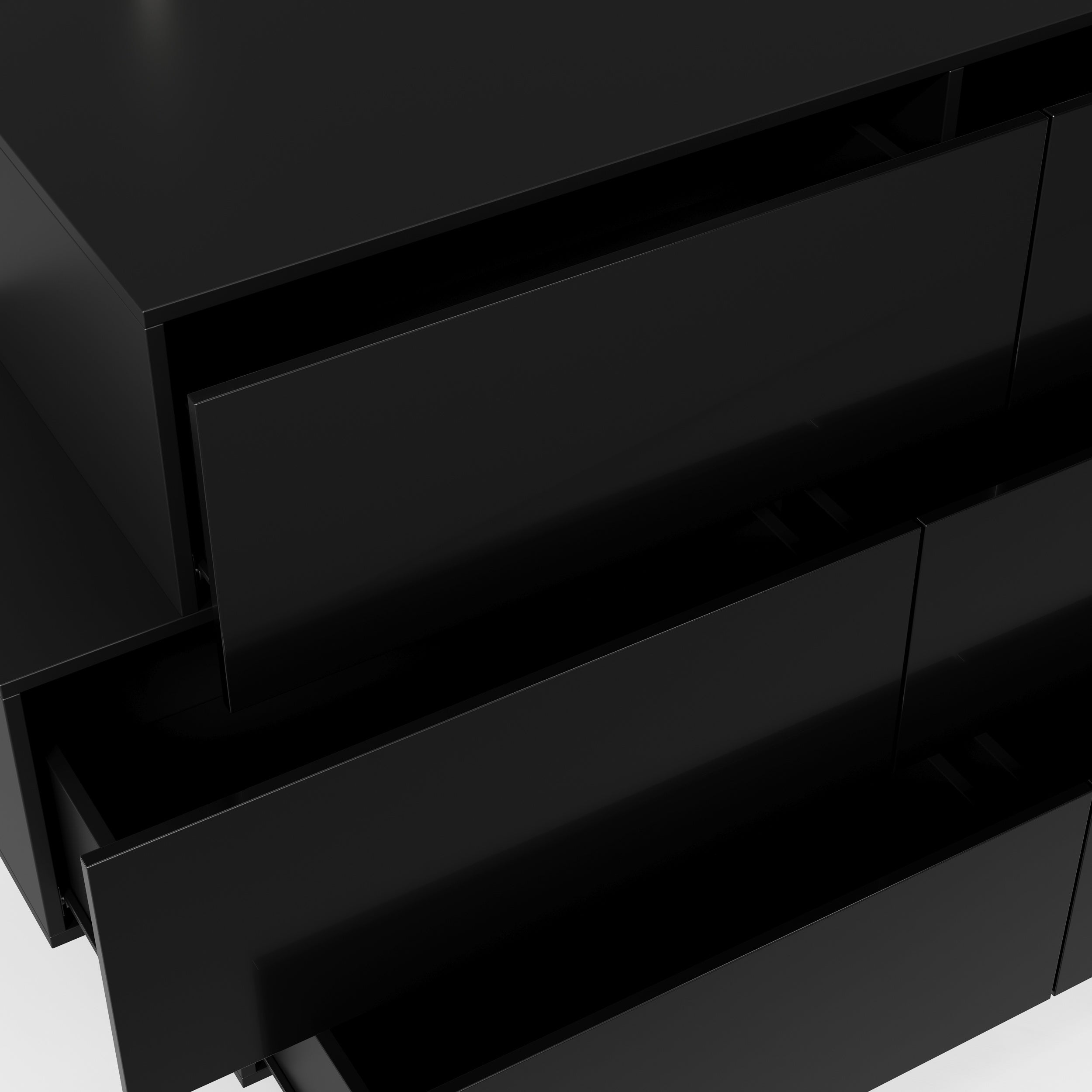 Black high-gloss dresser with wide drawers and vanity mirror setup