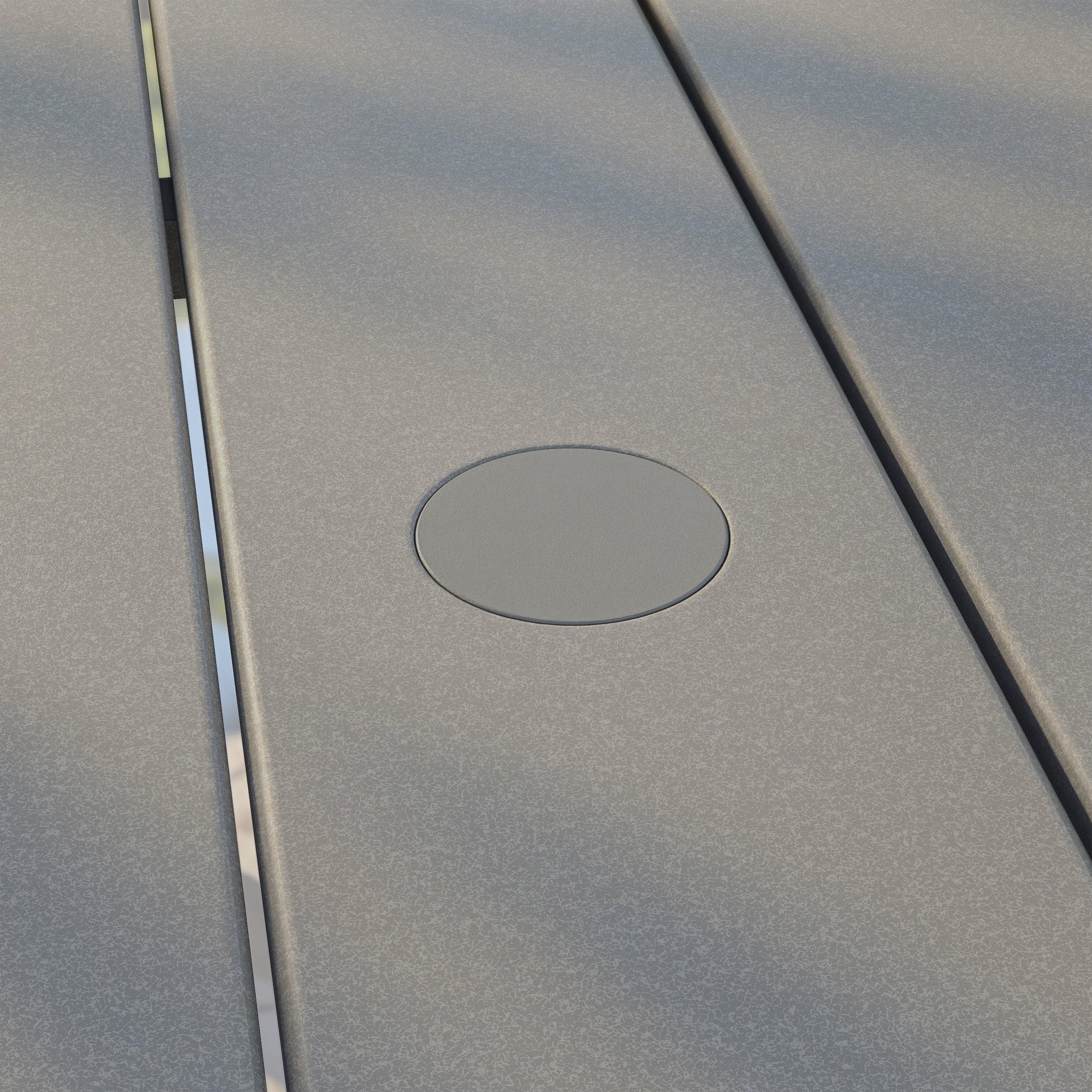 Close-up of a metallic surface with a circular cutout