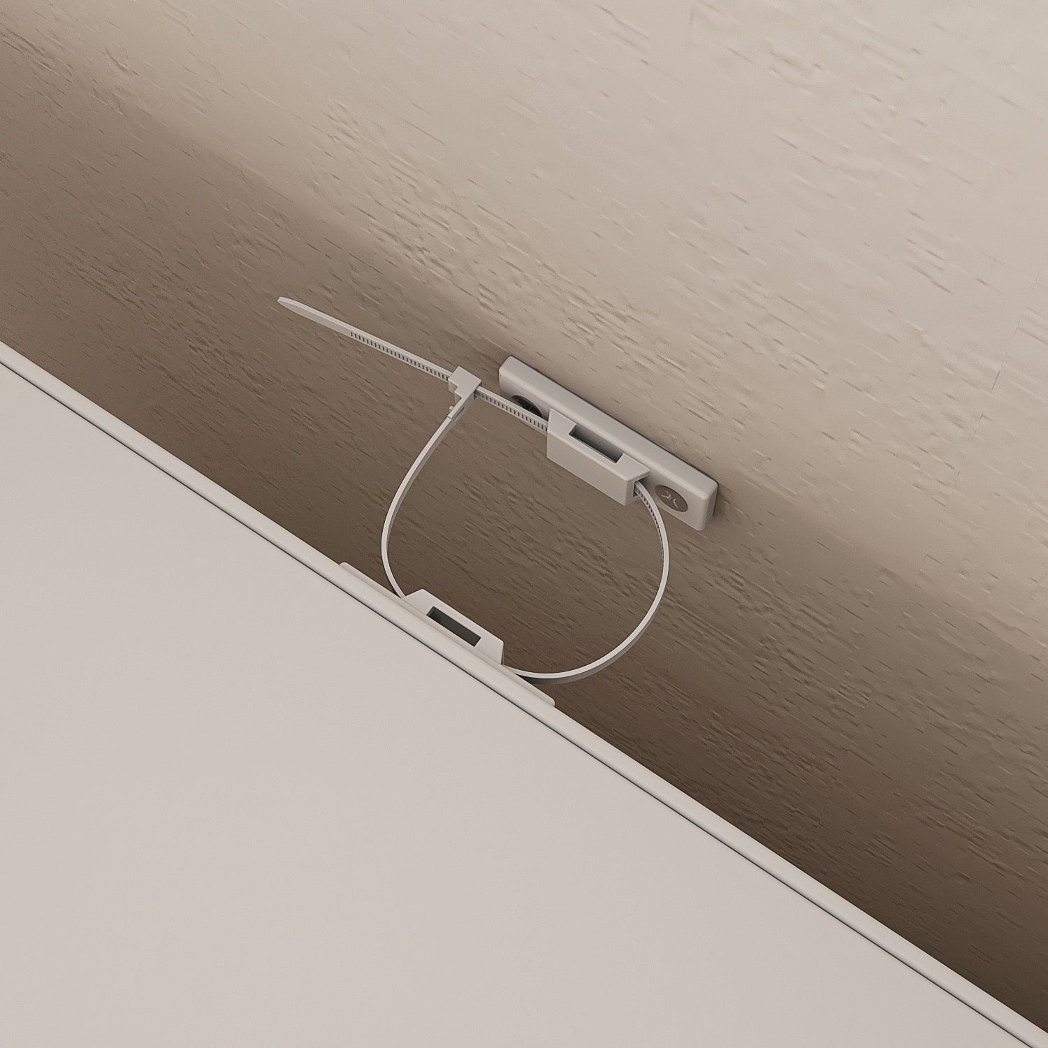 White wardrobe with gold handles in a modern bedroom setting