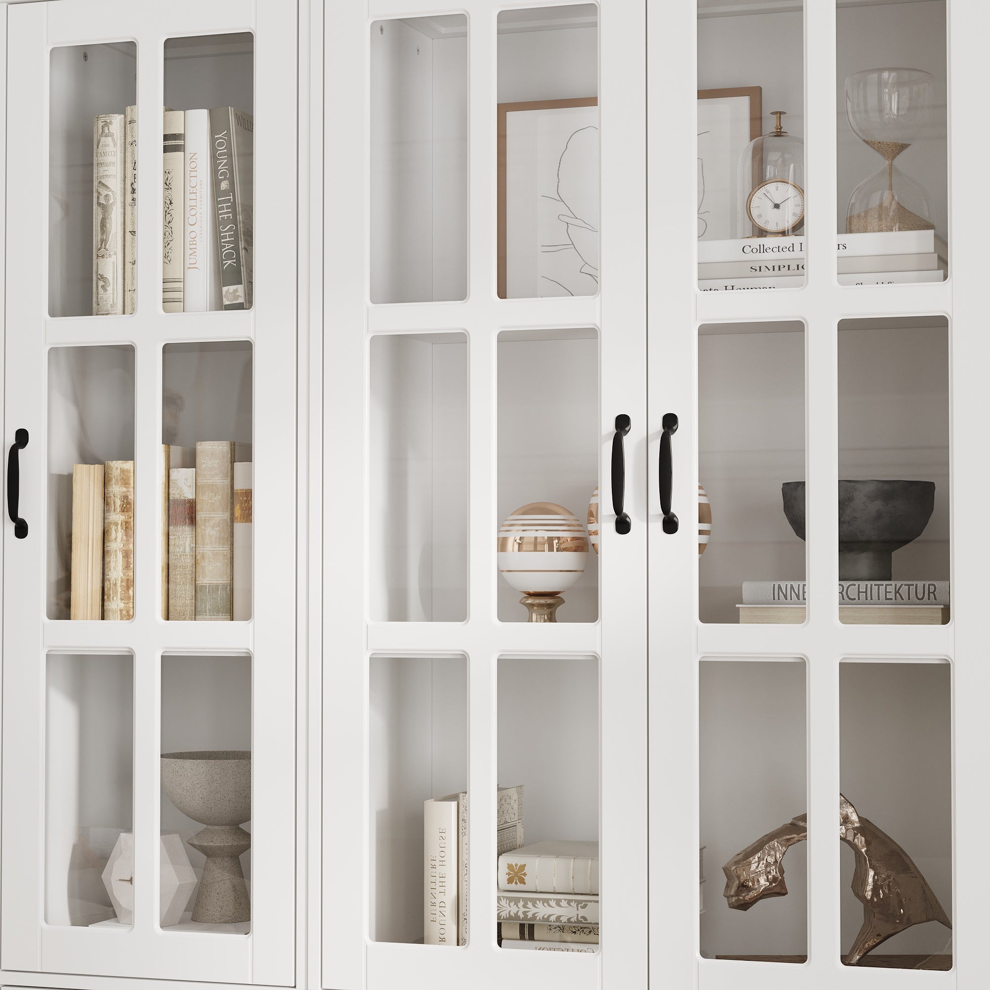White bookcase set with glass doors, lower cabinets, and center open shelves