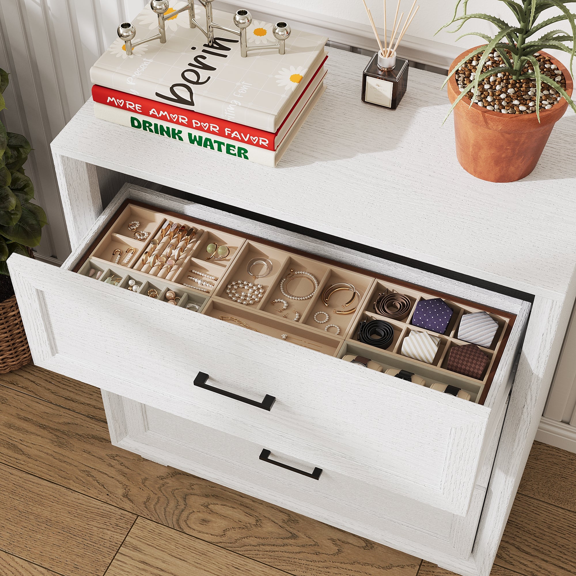 White 3-drawer nightstand with raised panel fronts and black handles