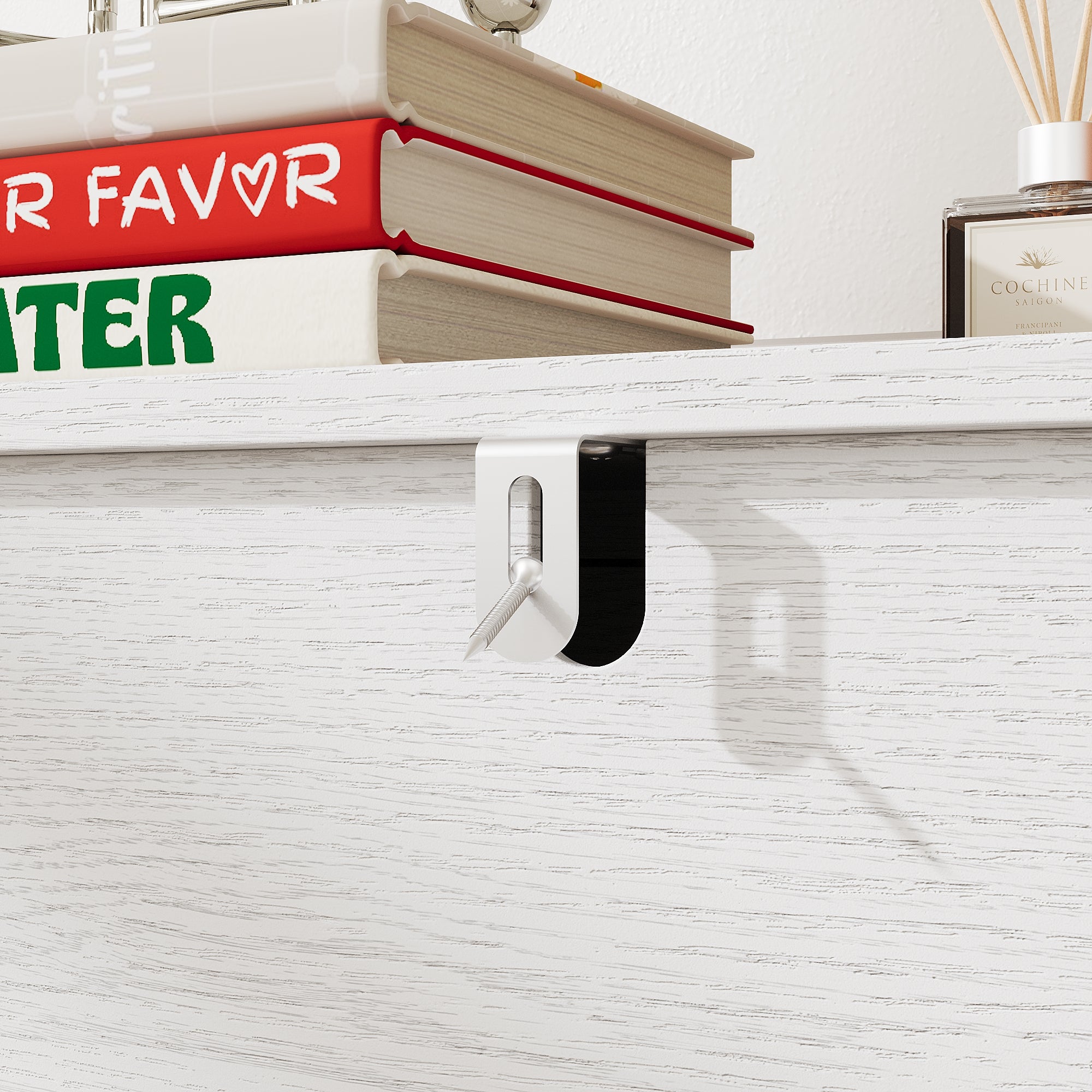 White 3-drawer nightstand with raised panel fronts and black handles