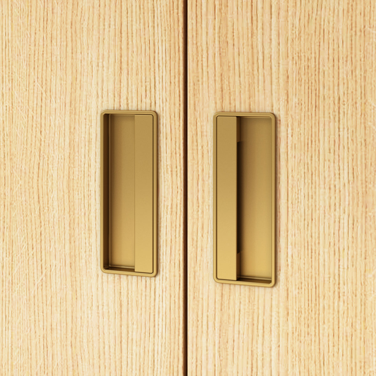 Close-up of wooden cabinet doors with gold handles