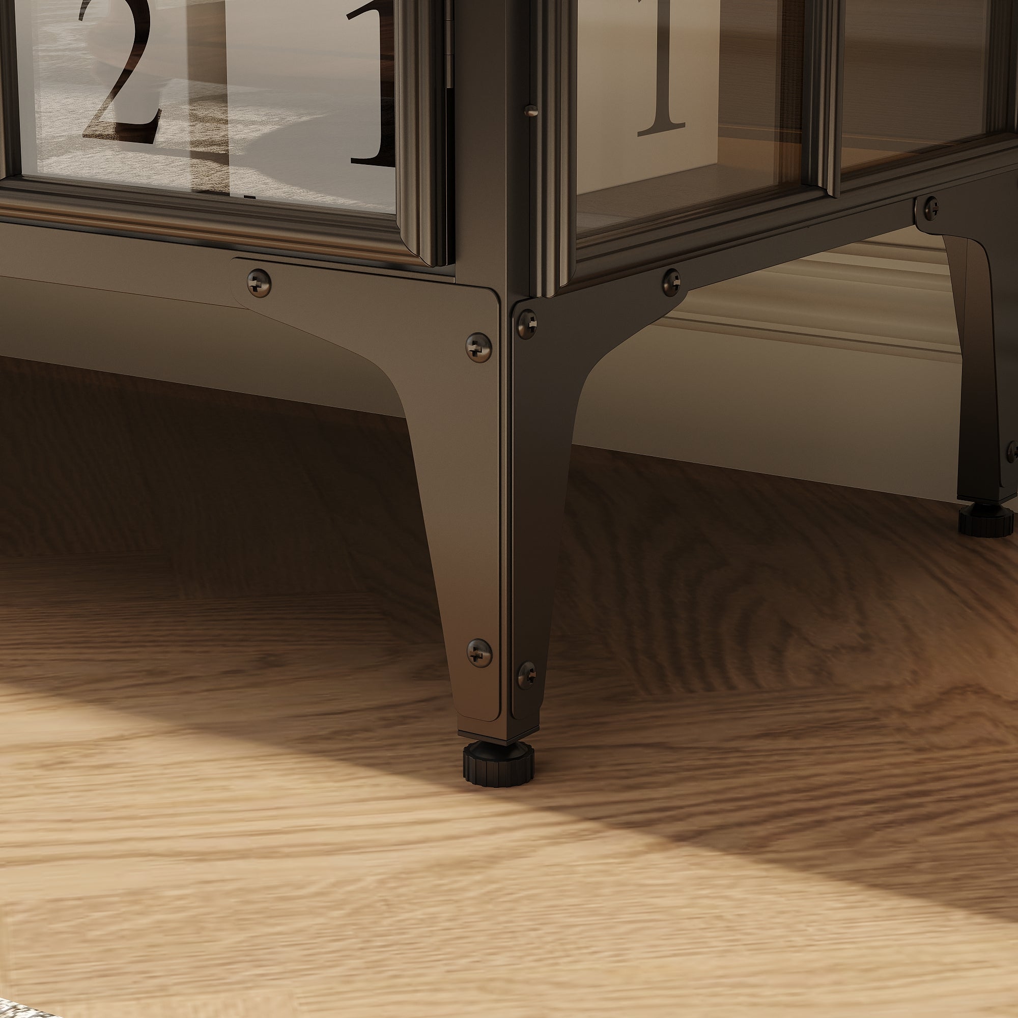 Close-up of a decorative table with glass panels on a wooden floor.