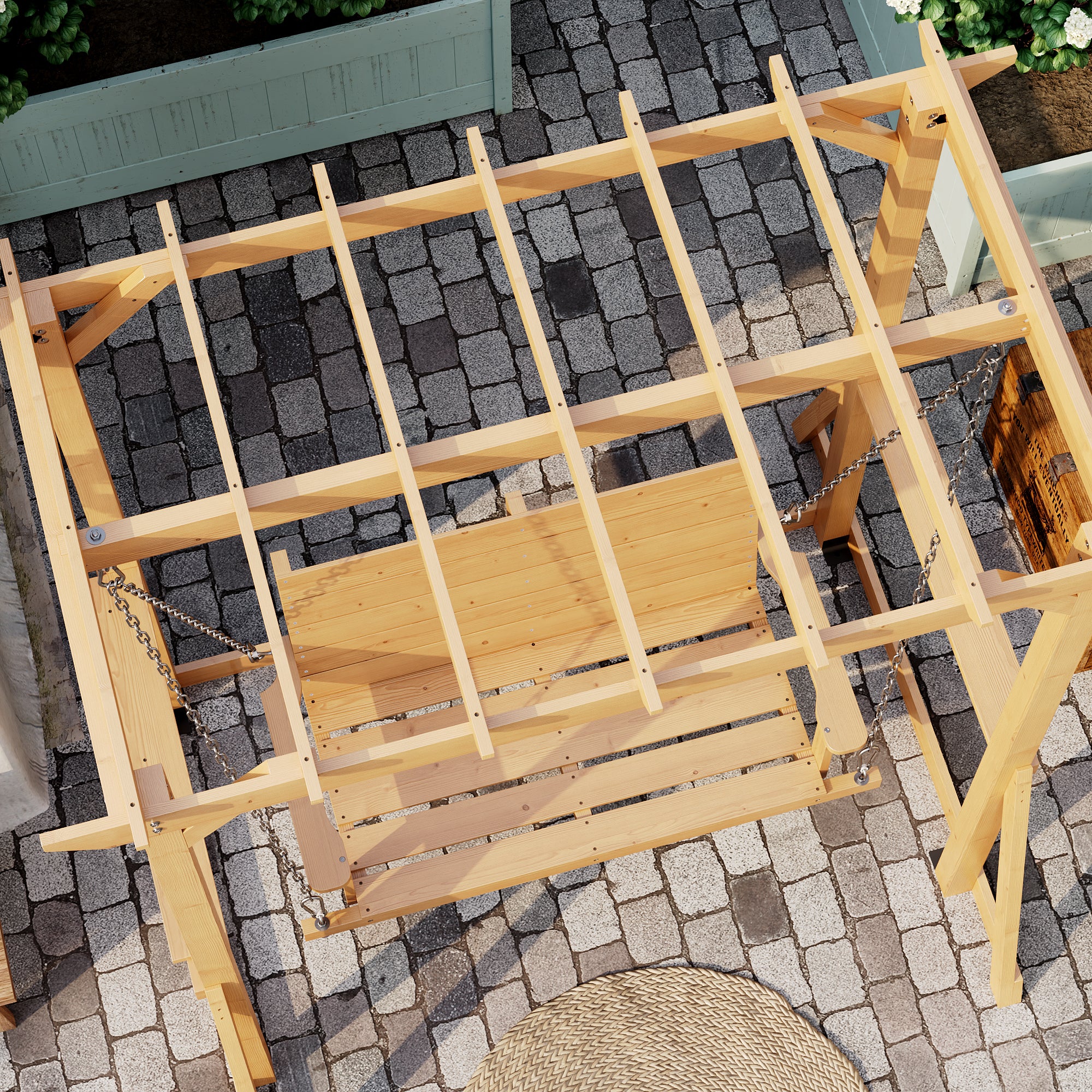 Wooden swing on a stone patio