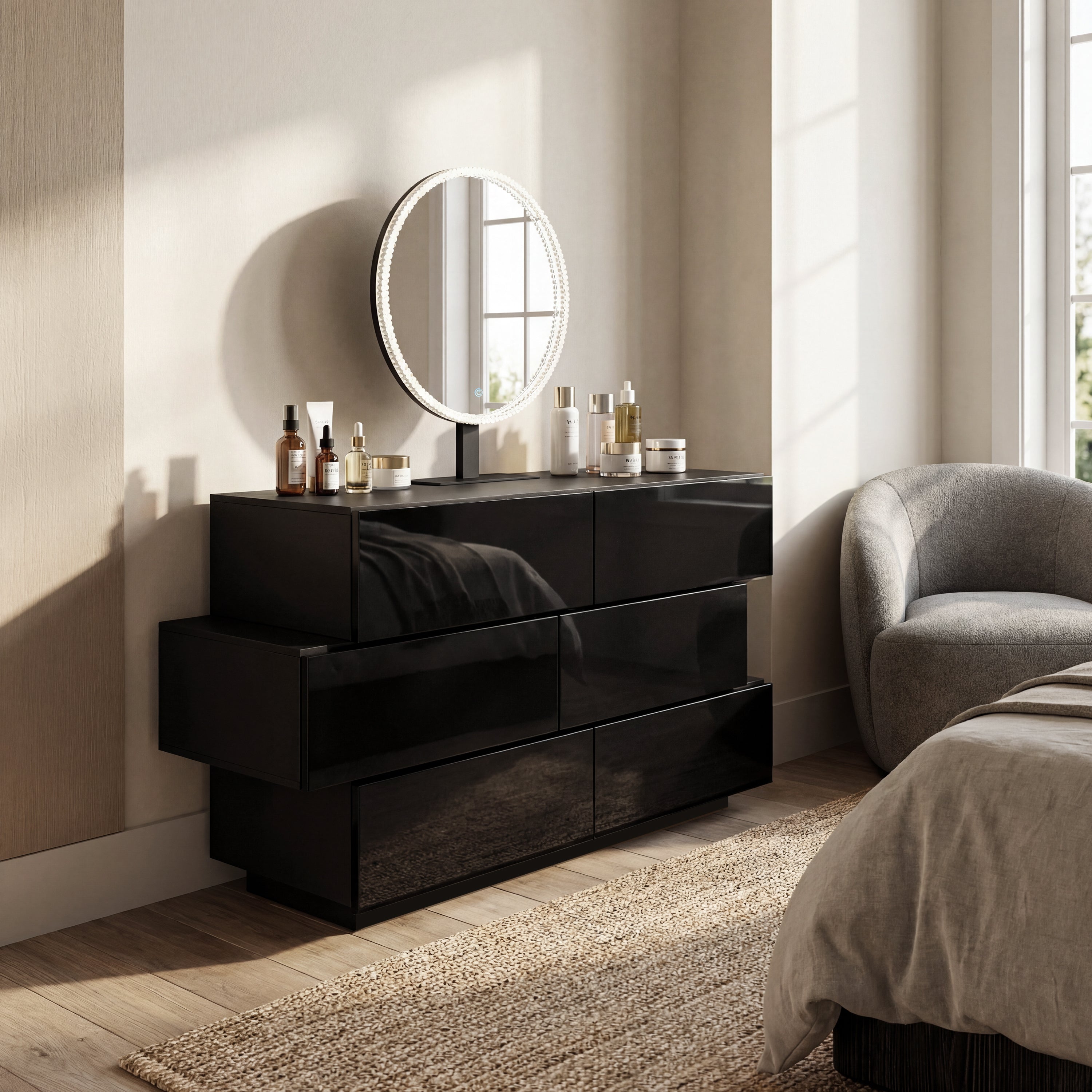 Black high-gloss dresser with wide drawers and vanity mirror setup