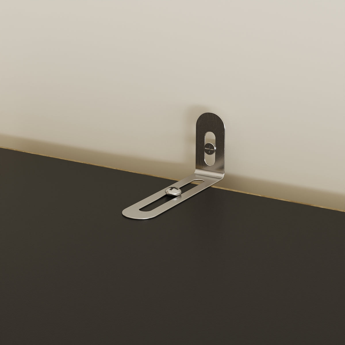 Metal bracket on a wall junction box with a neutral background