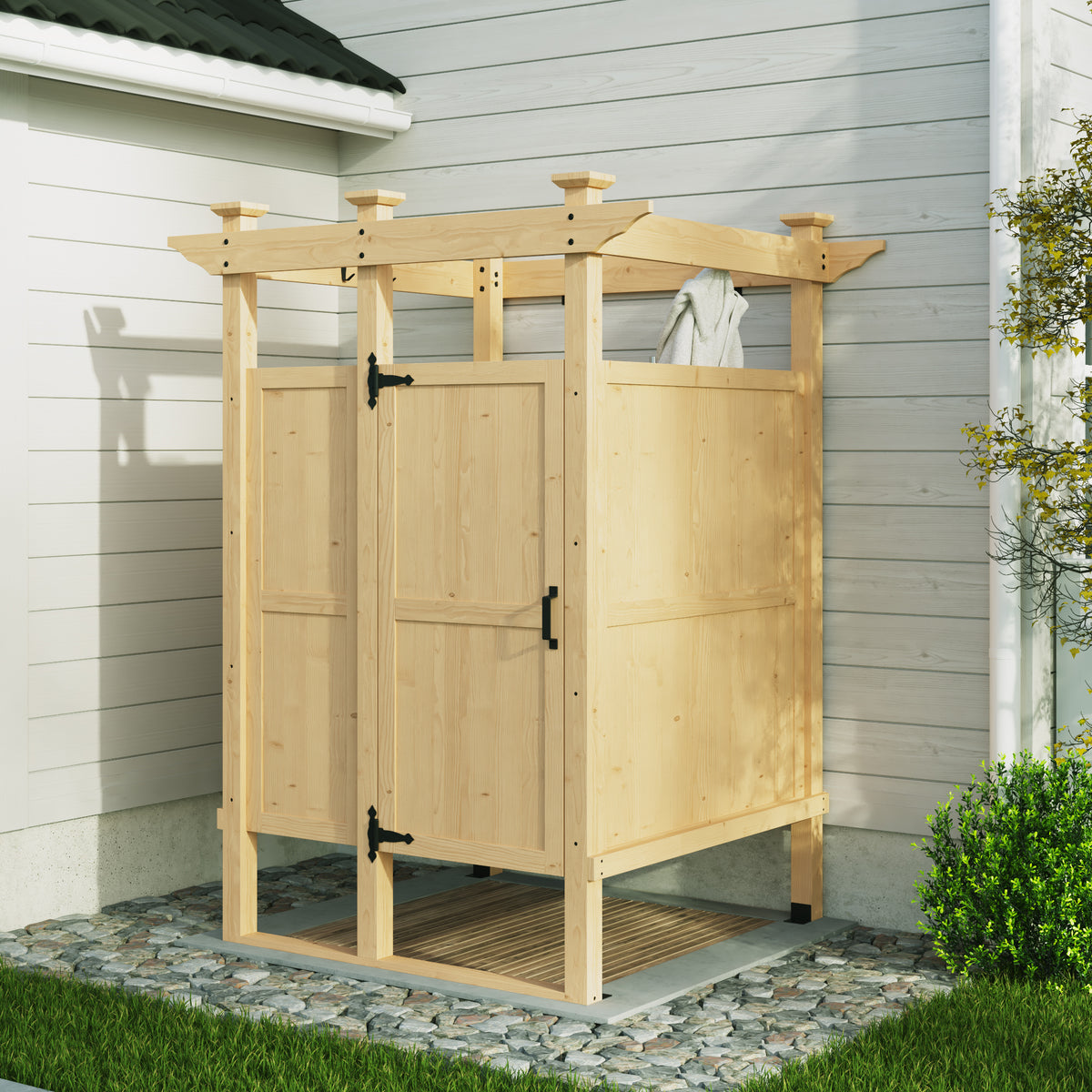 Wooden outdoor shower enclosure with a roof and doors, set against a house exterior