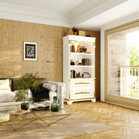 Living room with a white bookshelf, sofa, and decorative items.