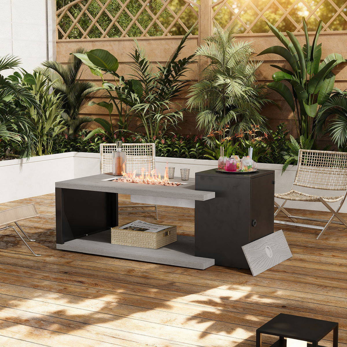 Outdoor patio with fire pit table, chairs, and plants on a wooden deck.