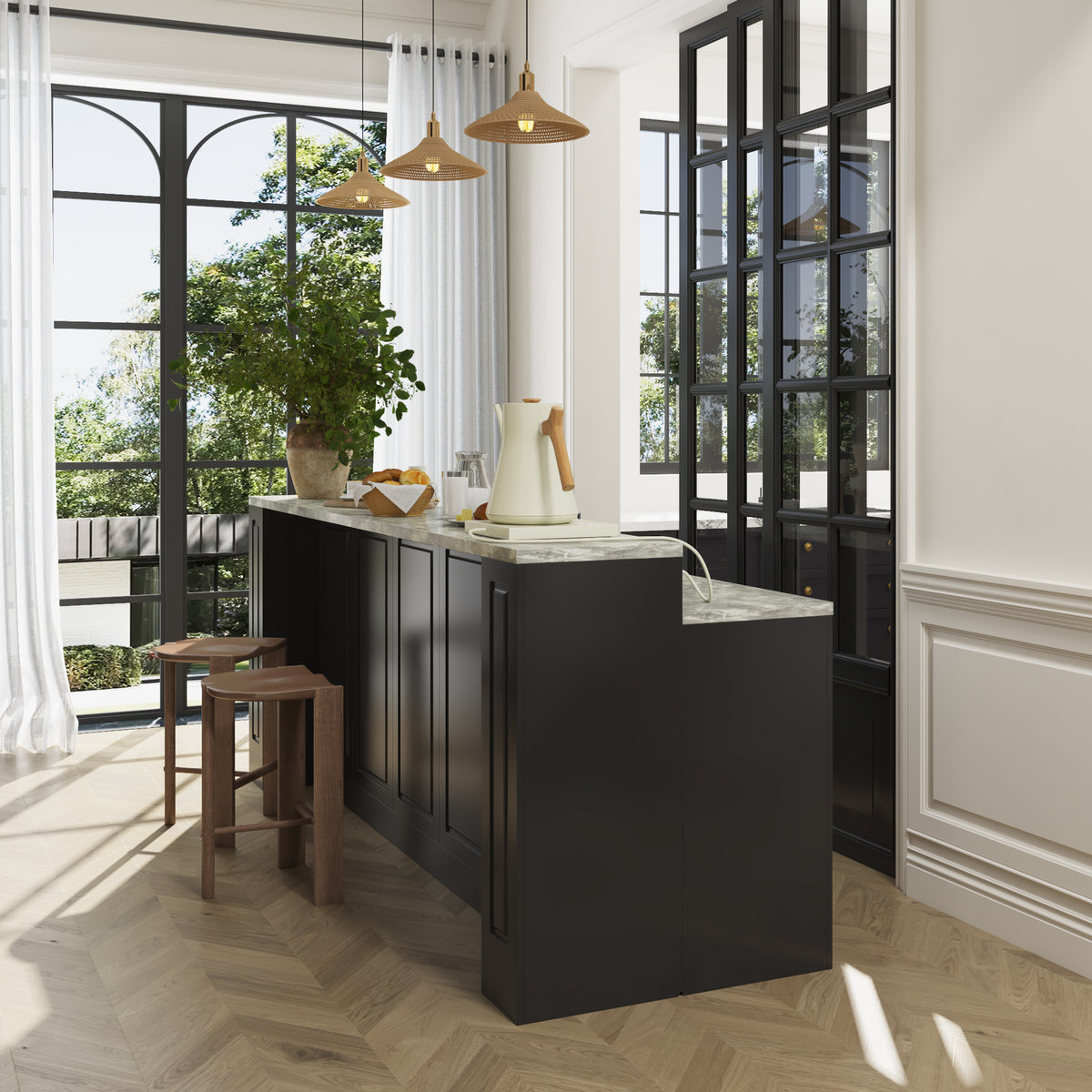 Modern kitchen with black island, marble countertop, and wooden stools.
