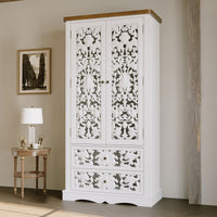 Dining room with a white ornate cabinet and wooden table