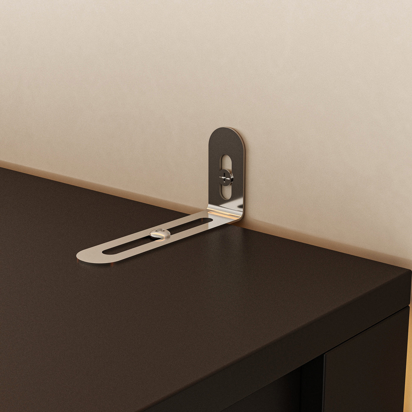 Metal bracket attached to a wooden surface with a neutral background