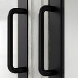 Arched display cabinet with glass doors and drawers
