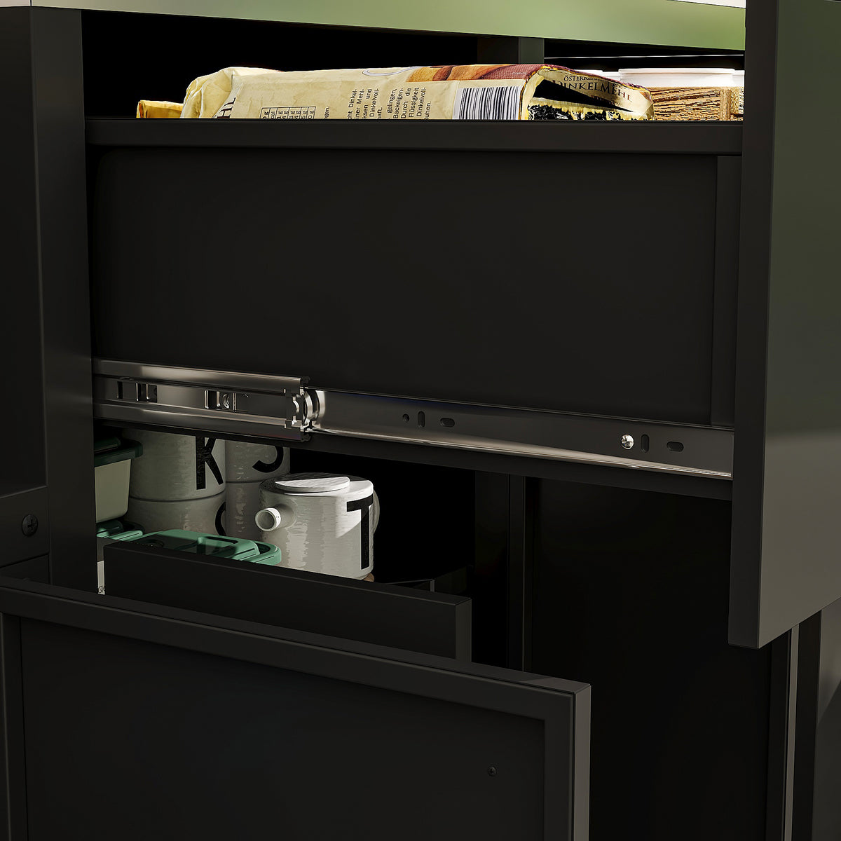 Black kitchen cabinet with open door revealing kitchen items.