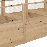 Wooden pet cage with wire top on a white background