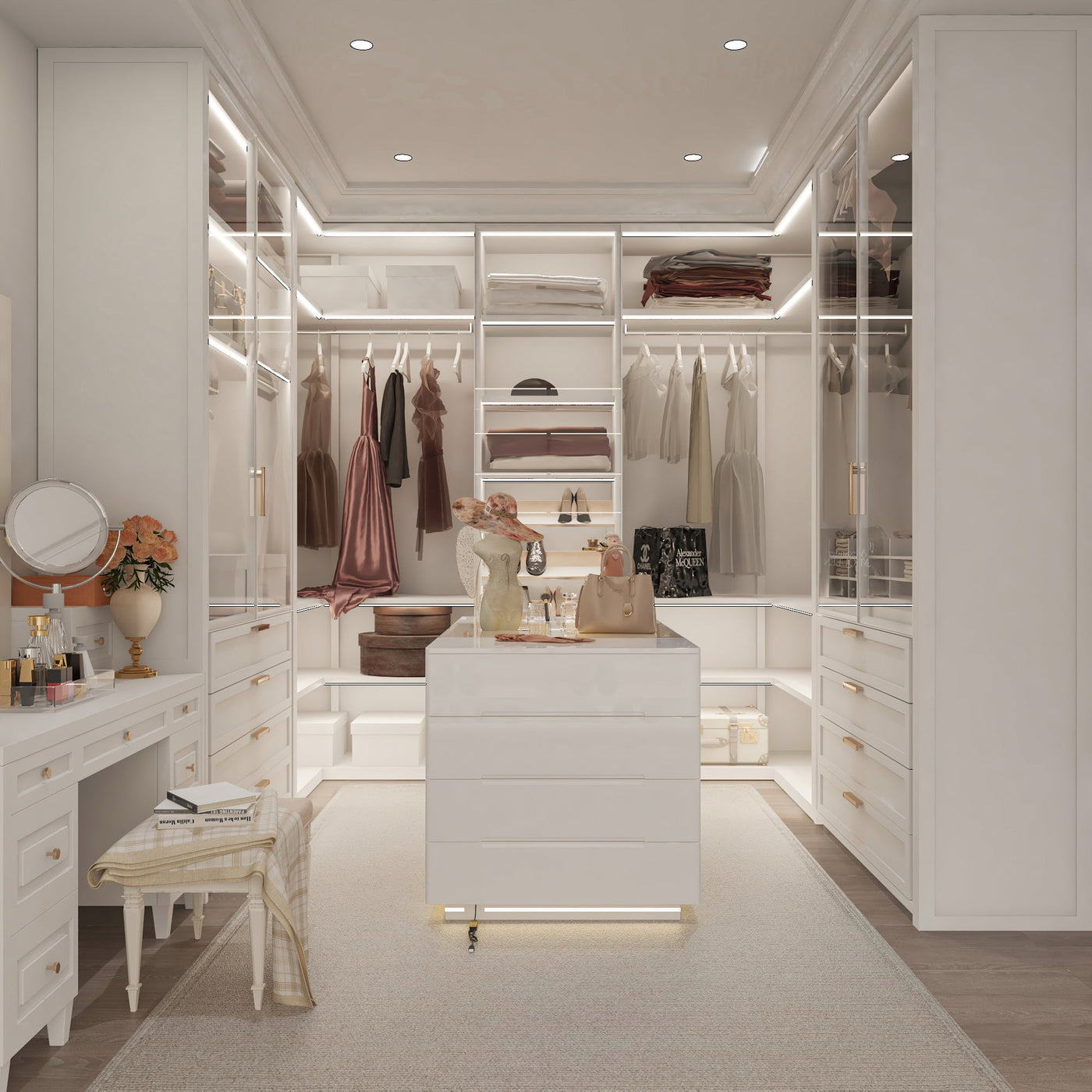 Modern walk-in closet with white furniture, clothing, and accessories.