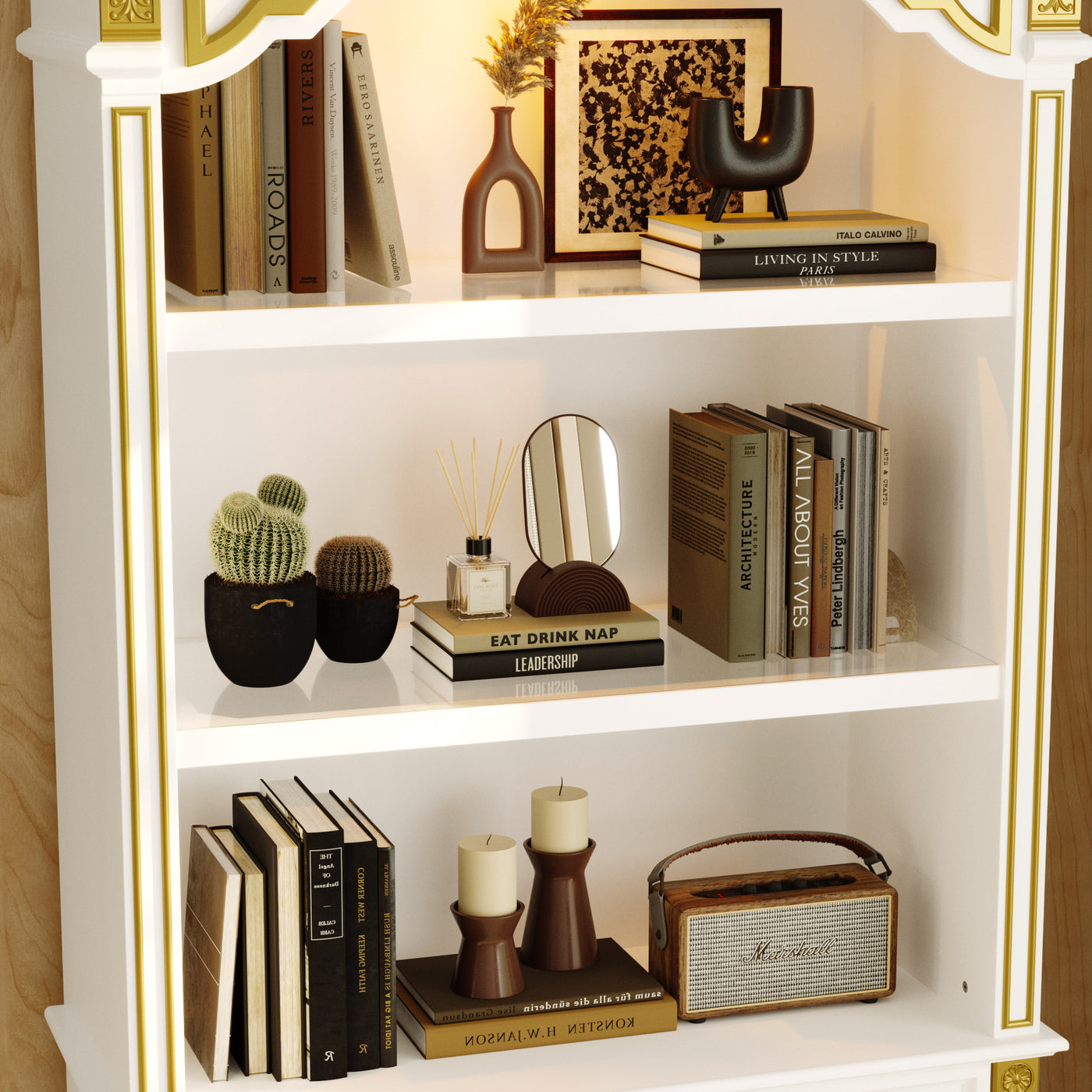 Decorative bookshelf with books, candles, and a mirror