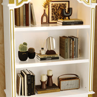 Decorative bookshelf with books, candles, and a mirror