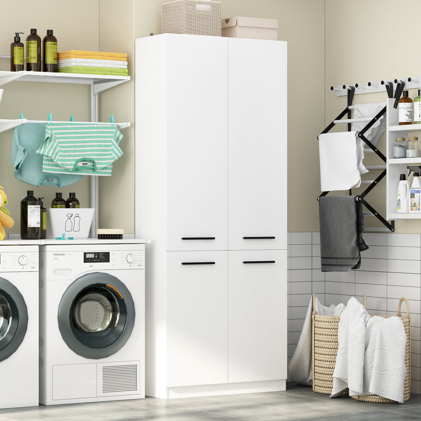 Laundry room with washing machine, dryer, and storage cabinet.