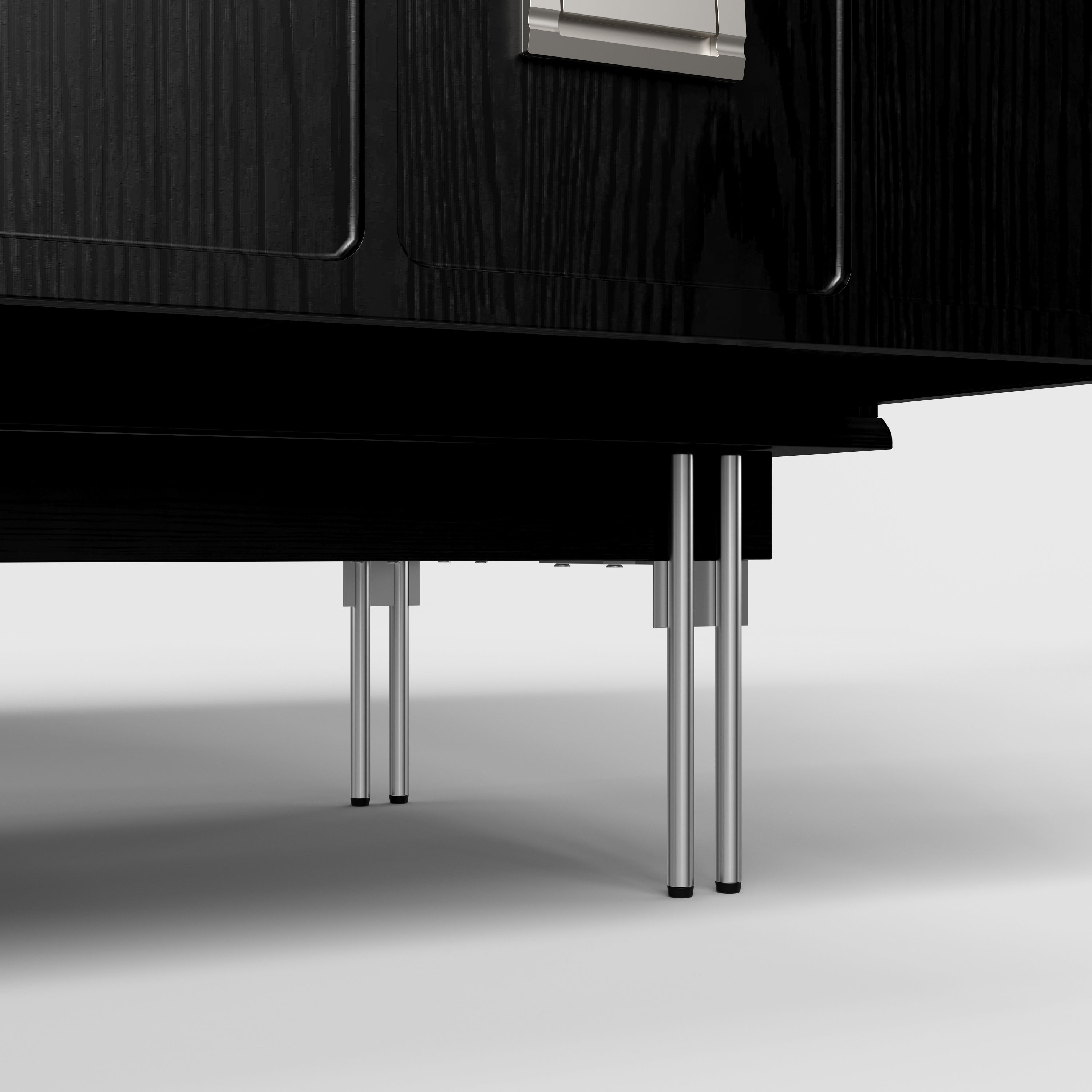 Modern black dresser with silver handles and metal legs