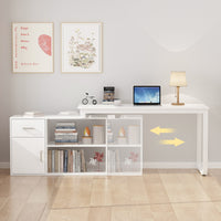 White office desk with shelves, books, and a laptop in a room with light gray walls.