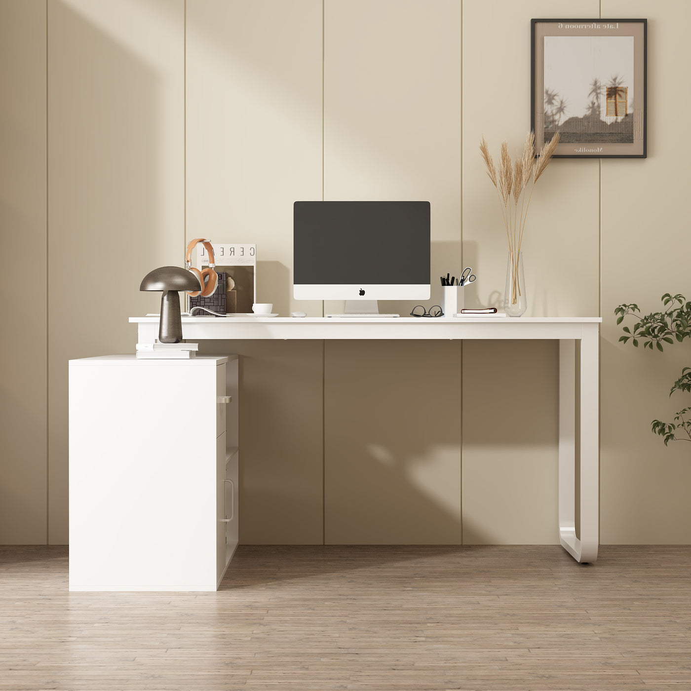Modern home office with a white desk, computer monitor, and decor items.