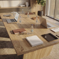 Wood dining table with V-shaped pedestal base 