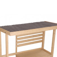 Wooden workbench with a metal top on a white background