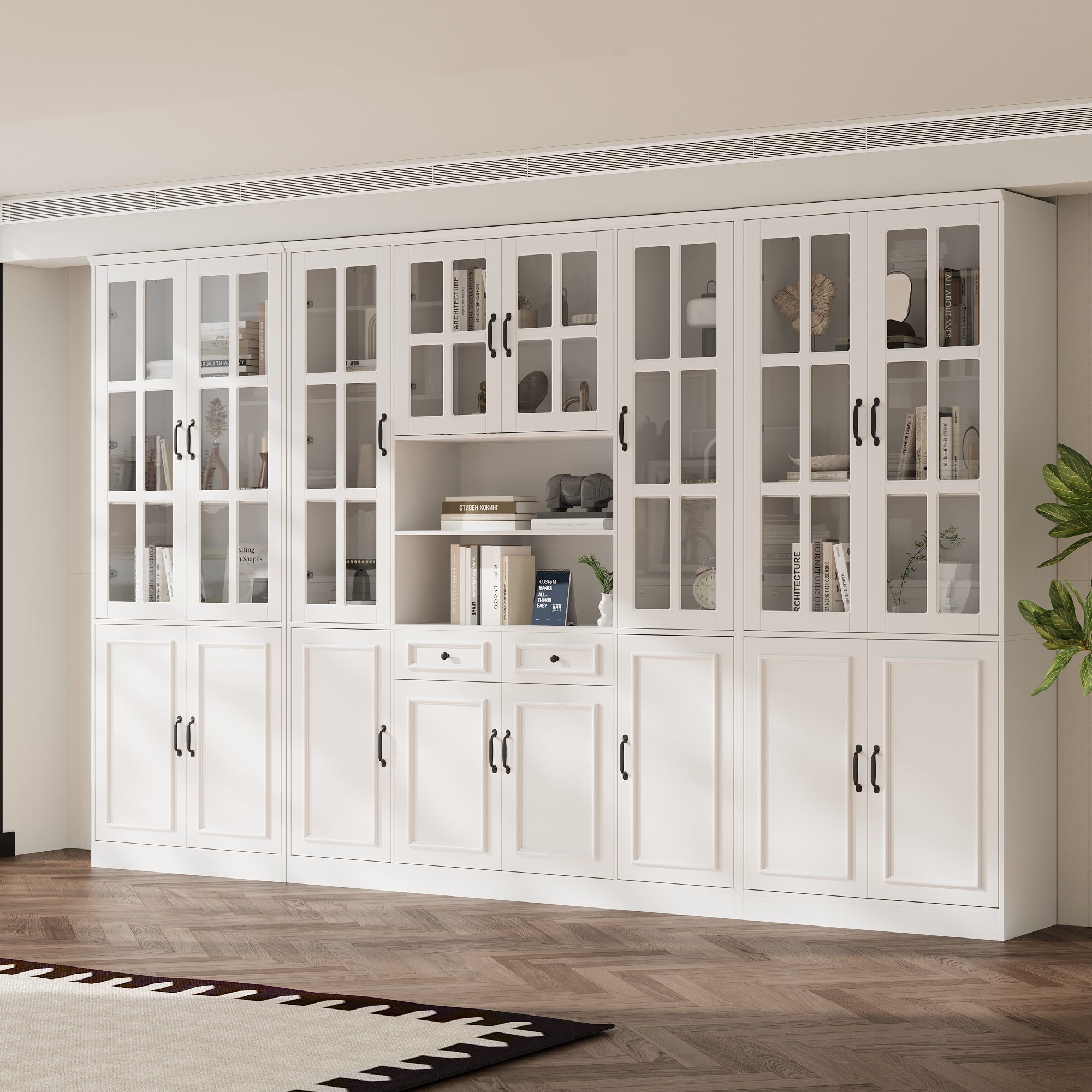 White bookcase set with glass doors, lower cabinets, and center open shelves