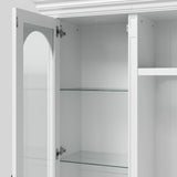 White entertainment center with open TV space, glass side cabinets, lower storage cabinets, and drawers
