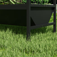 Black metal planter box on grass