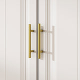 White wardrobe with gold handles in a modern bedroom setting