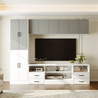 Modern living room with a television mounted on a wall unit.