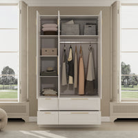 White armoire with mirror door, top cabinets, and lower drawers