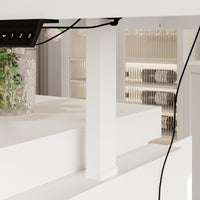 Modern white kitchen island with height-adjustable top and storage cabinets