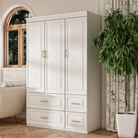 White wardrobe with gold handles in a modern bedroom setting