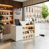 White reception desk with open display shelves and built-in LED lighting
