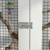 Glass shower enclosure with a handle on a tiled wall background