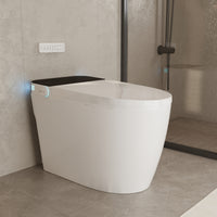 White smart toilet with open lid, built-in bidet, and ambient night light