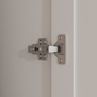 White armoire with mirror door, top cabinets, and lower drawers