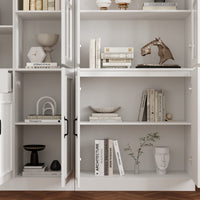 White bookcase set with glass doors, lower cabinets, and center open shelves