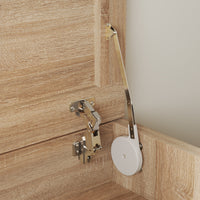 Close-up of a wooden door with a hinge and roller mechanism