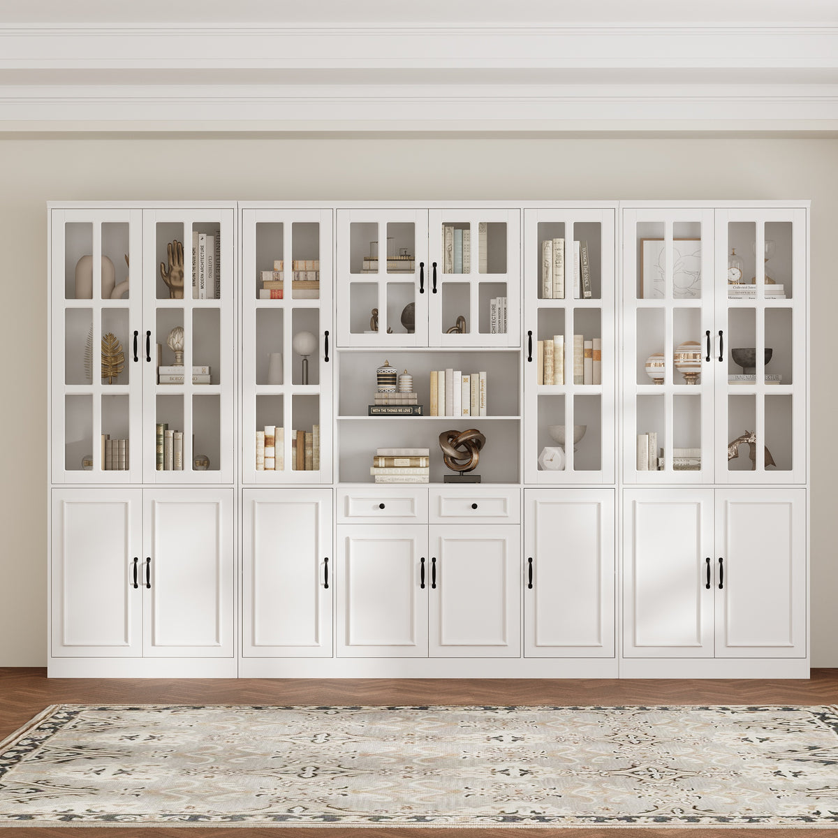 White bookcase set with glass doors, lower cabinets, and center open shelves