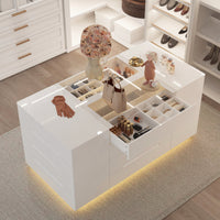 Modern white storage unit with shelves and drawers in a room setting.