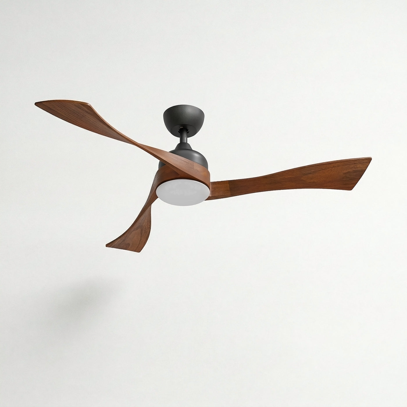 Ceiling fan with wooden blades and a black light fixture on a white background